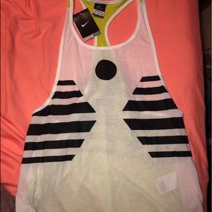 Black, white, and green Nike tank top